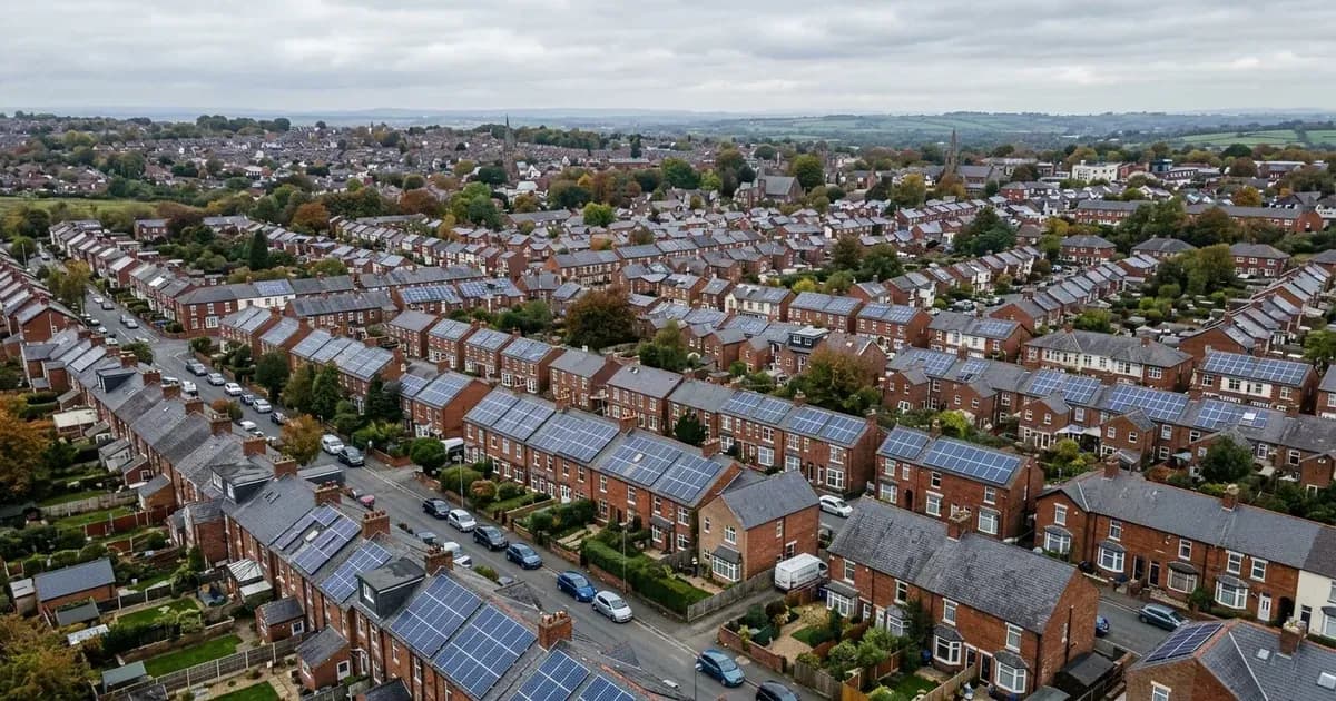 Dense residential rooftop solar panel installations across suburban UK houses under overcast daylight. — SolarNevs spec card
