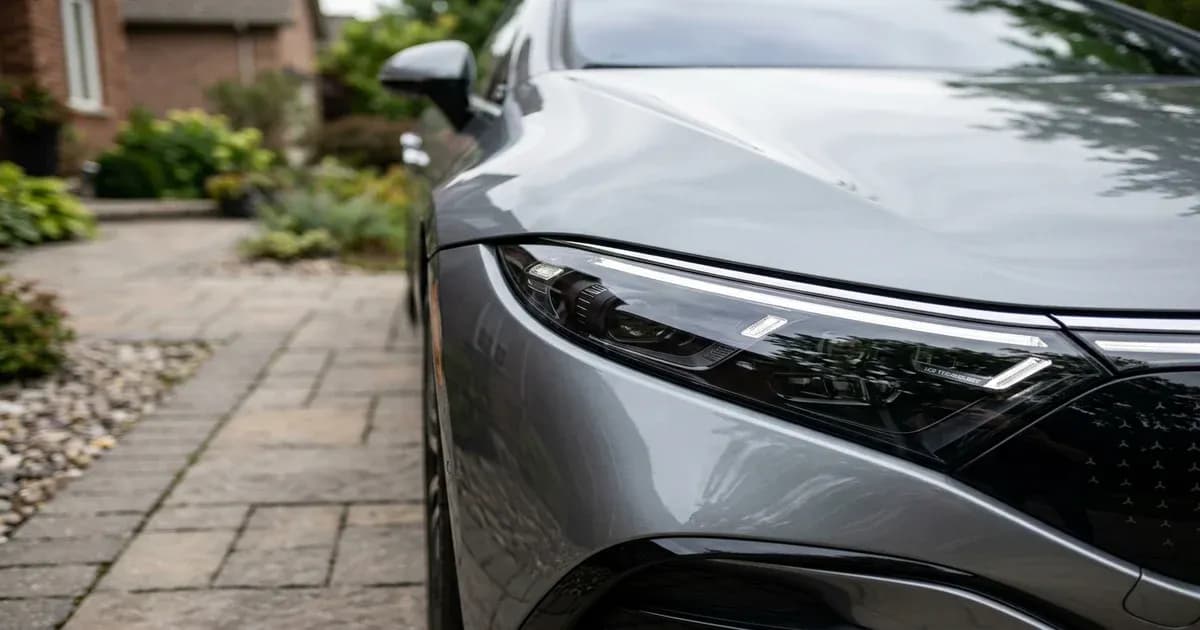 BYD Seal premium electric sedan parked in a driveway in Pakistan — SolarNevs spec card