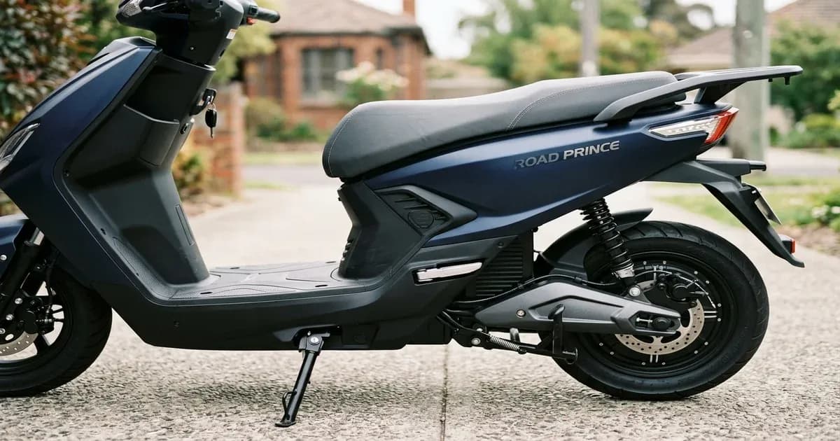 Road Prince electric bike parked on a Pakistani street in warm afternoon light — SolarNevs spec card