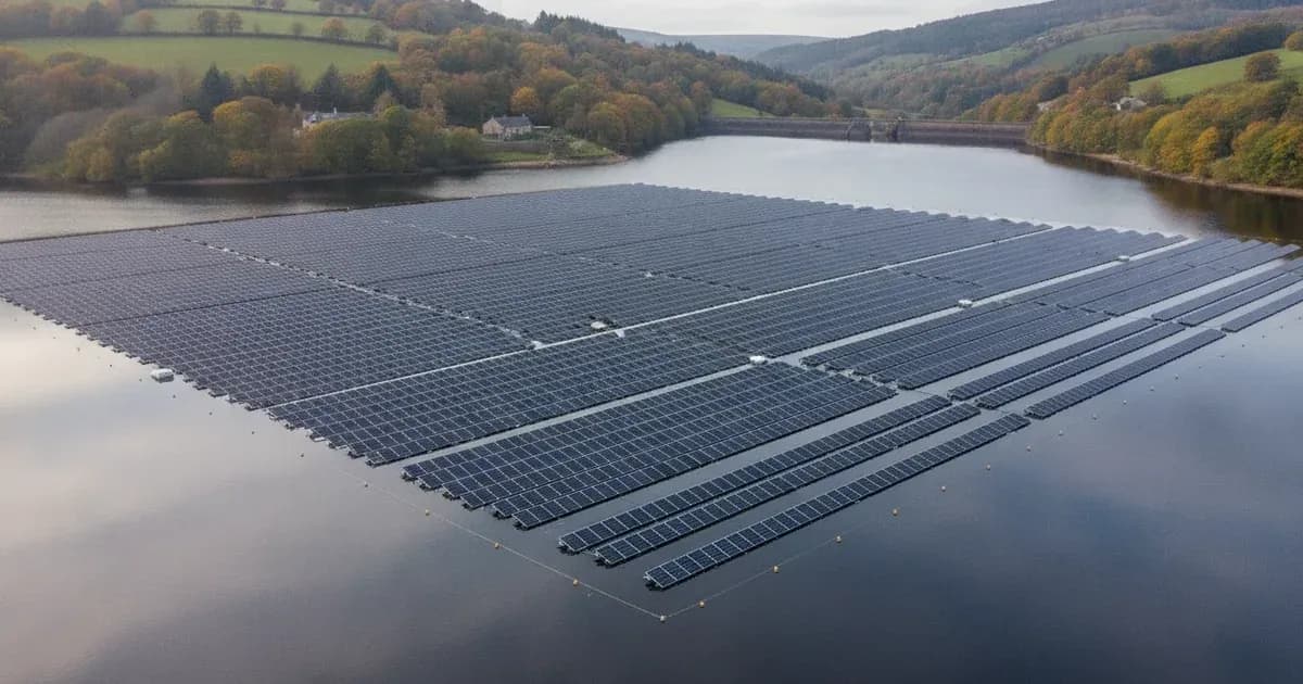 A calm, wide shot of a floating solar PV array on a reservoir in Great Britain, with subtle anchoring lines visible — SolarNevs spec card